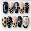 Harriet handcrafted press-on nails in blue, black & white | Eleanor May Collective